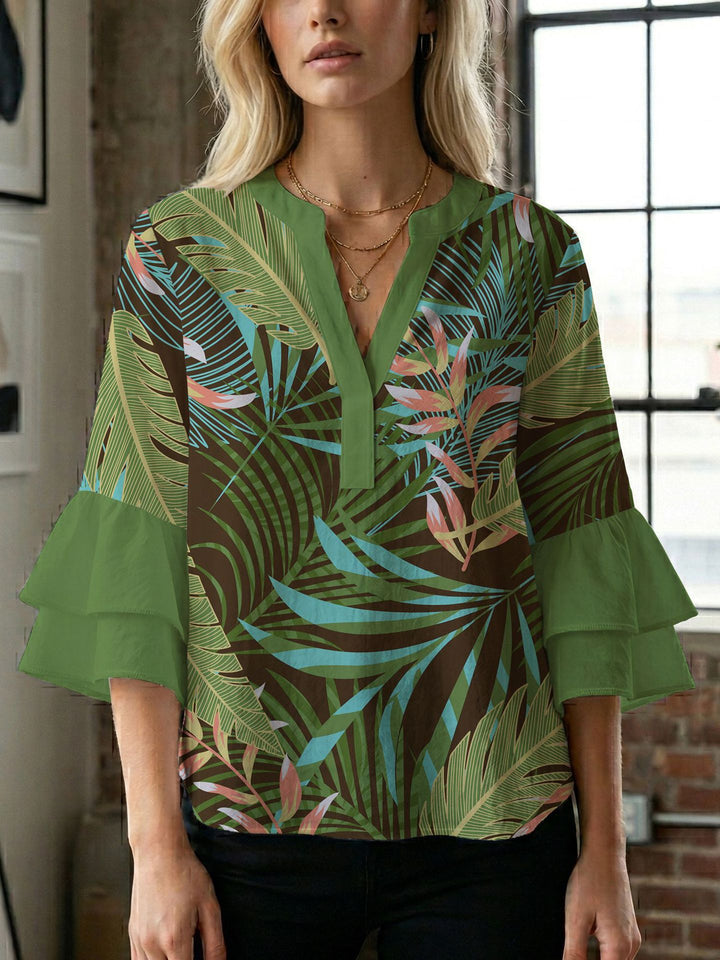 Damen Bluse mit voluminösen Flügelärmel und intensivem Blattmuster Echo Archiv