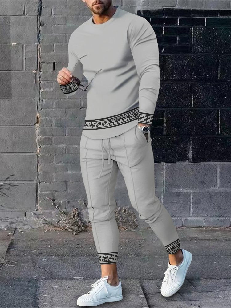 Herren sportliches Set aus Langarmshirt und Jogginghose mit modernem Streifenmuster Echoarchiv