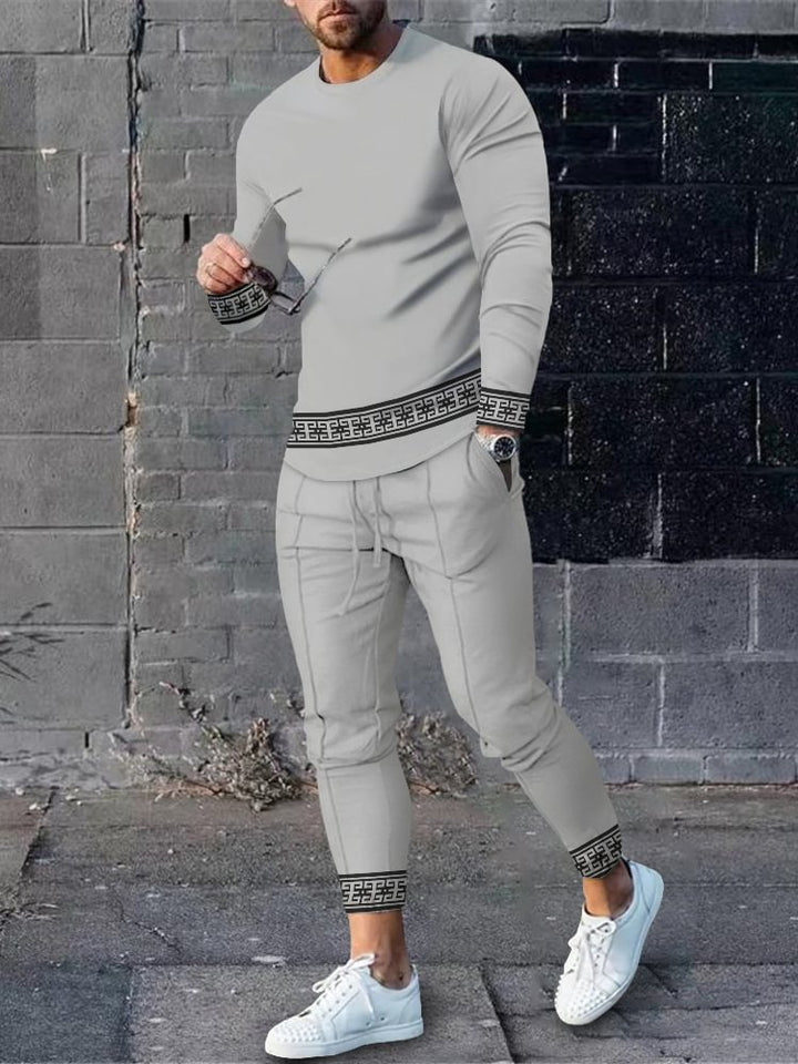 Herren sportliches Set aus Langarmshirt und Jogginghose mit modernem Streifenmuster Echoarchiv