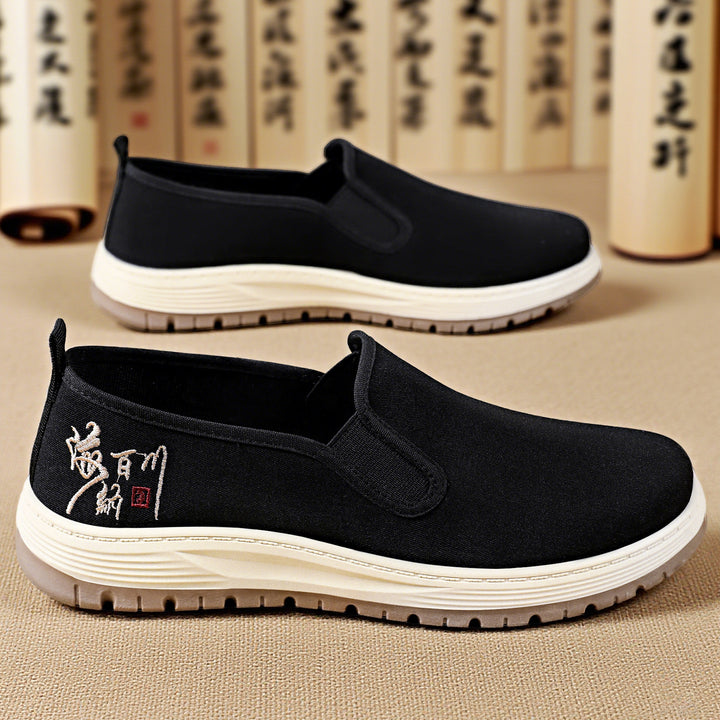 Herren nan nahtloser Canvas-Slip-On mit elastischem Einstieg, besticktem Fersenmotiv und rutschfester EVA-Laufsohle Echo Archiv