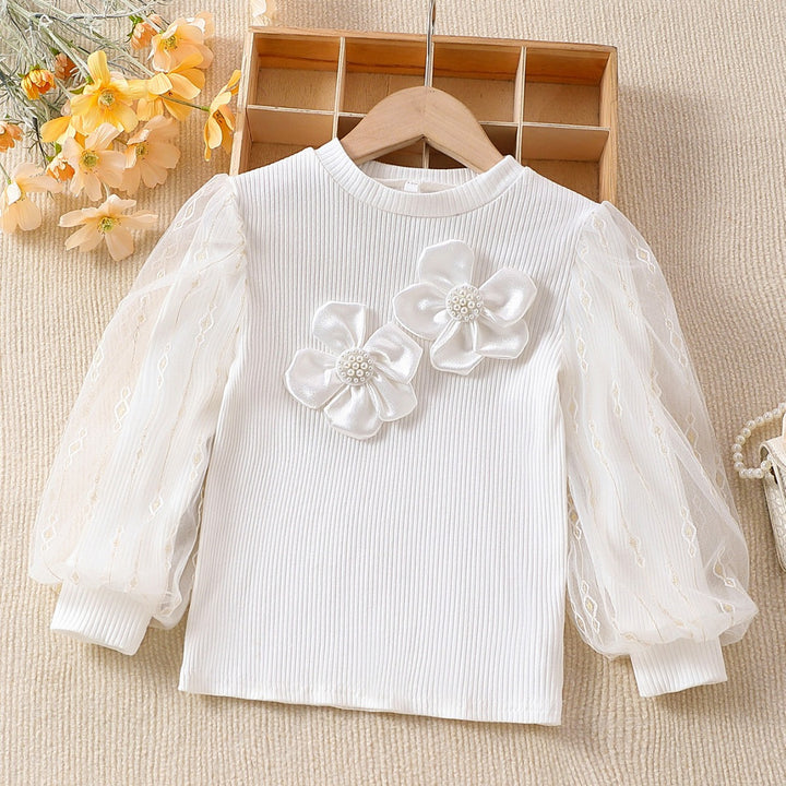 Mädchen modische Bluse mit transparenten Puffärmeln und floralen Akzenten Echo Archiv
