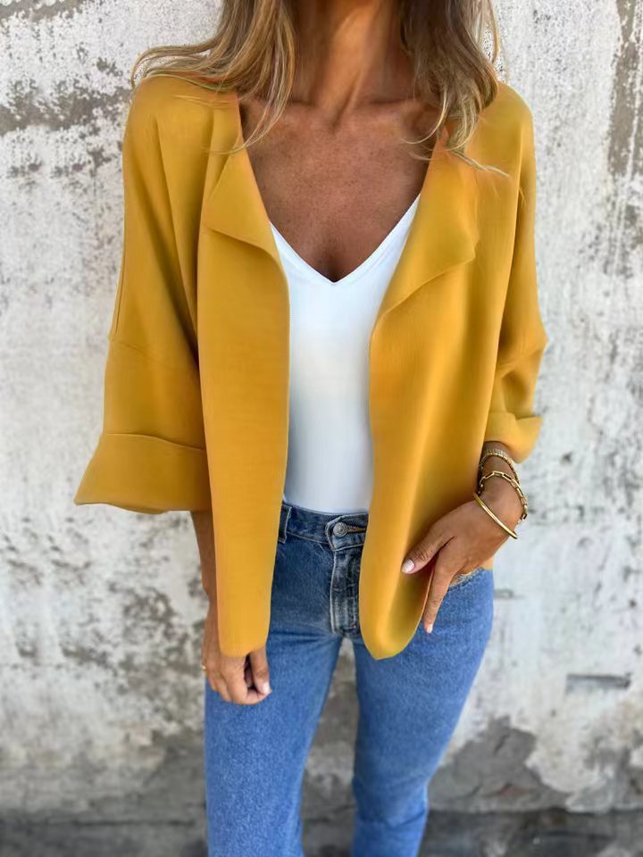 Damen nan legerer offener Strickcardigan mit Schalkragen krempelbaren Ärmeln und kastiger Silhouette Echo Archiv