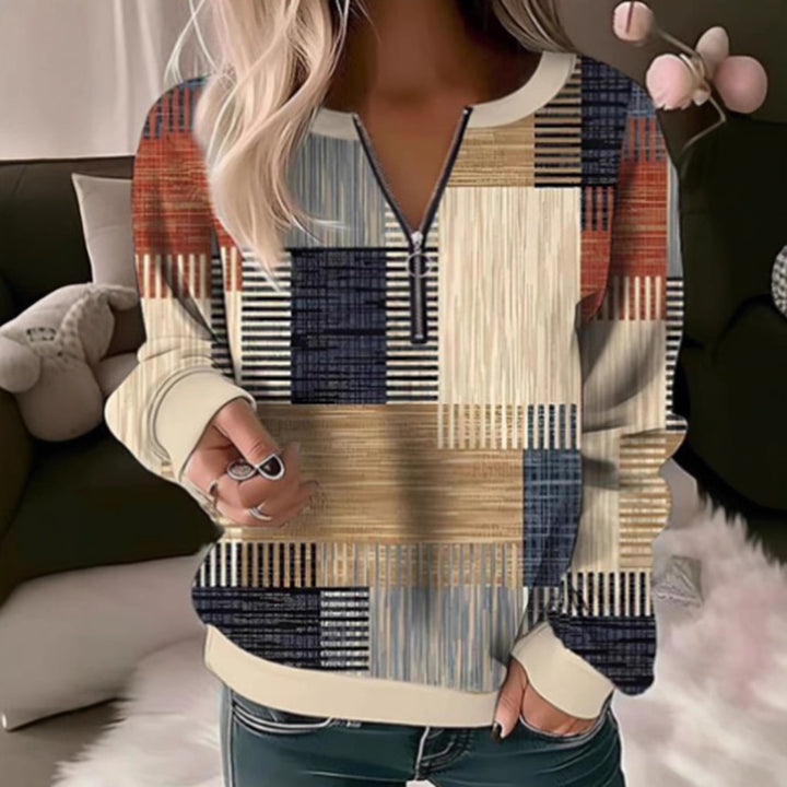 Damen nan gemütlicher Pullover mit kurzem Reißverschluss, grafischem Patchworkmuster, verlängerten Ärmelbündchen und geripptem Saum Echo Archiv