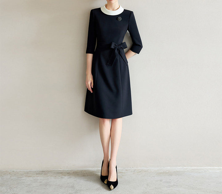 Damen Elegantes Midikleid mit Taillengürtel Echoarchiv