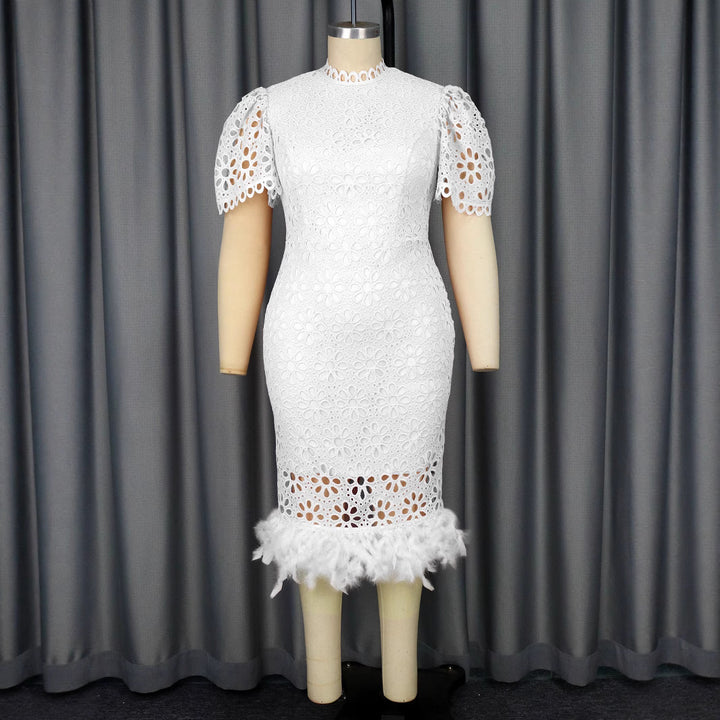 Damen Hochwertiges Spitzenkleid mit voluminösen Puffärmeln und fransigem Saum Echo Archiv