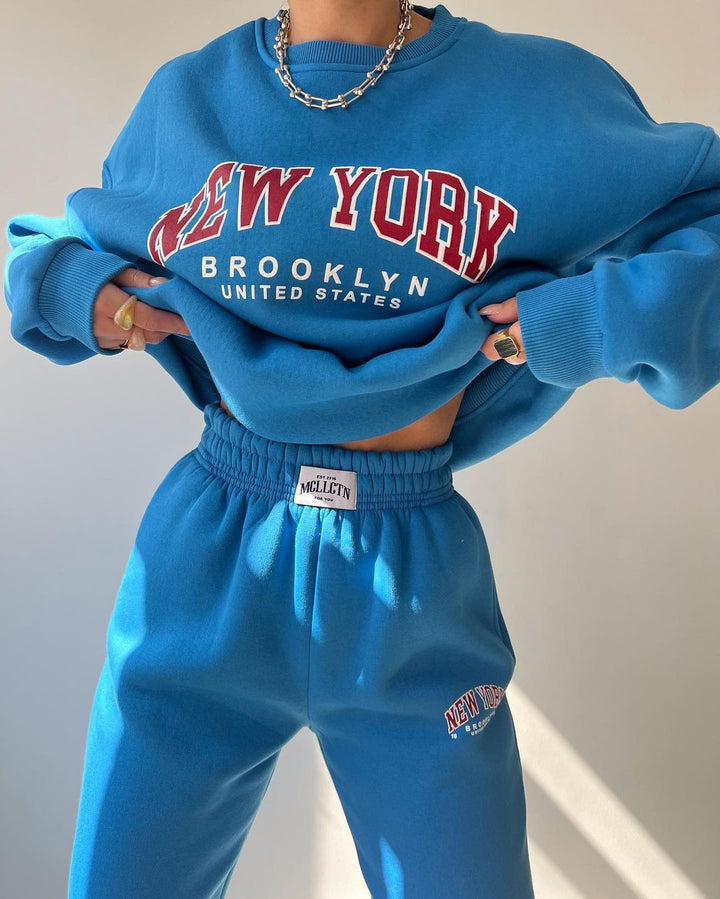 Damen Oversized Lounge-Set aus Baumwollfleece mit Collegestickerei und relaxed Jogginghose Echoarchiv