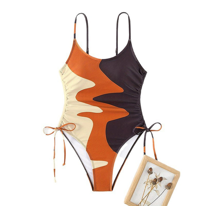 Damen Einteiler Badeanzug mit asymmetrischem Muster und verstellbarem Bindeband Echo Archiv