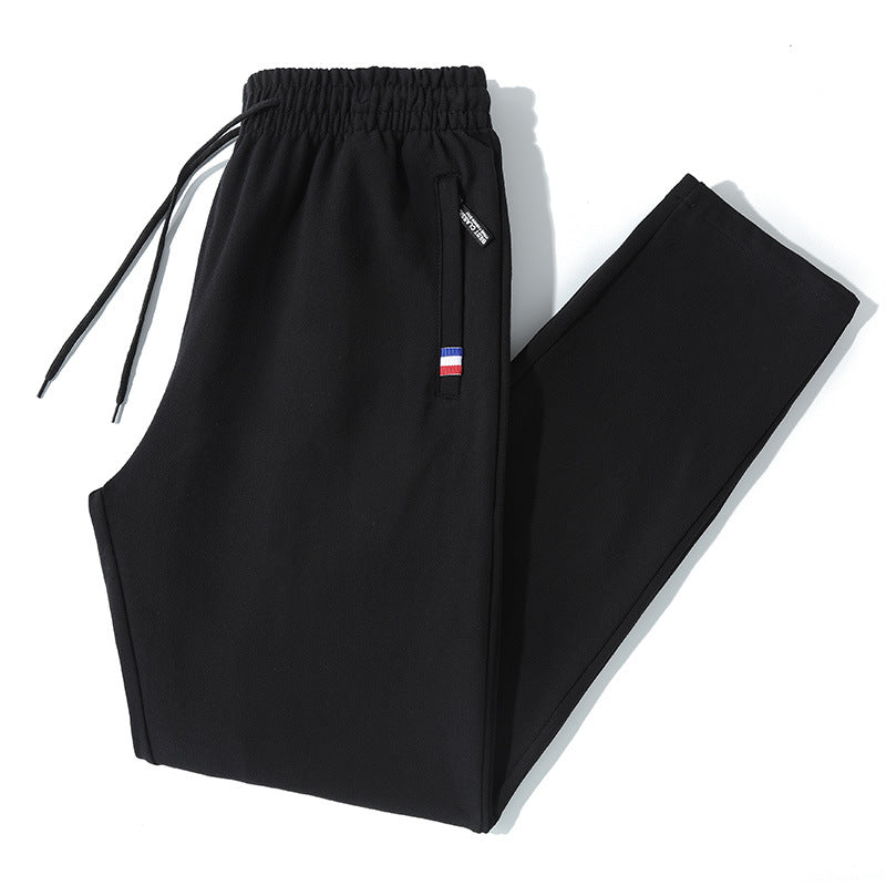 Herren Tapered-Jogginghose mit Tunnelzug, Reißverschlusstasche & Rippbündchen Echo Archiv