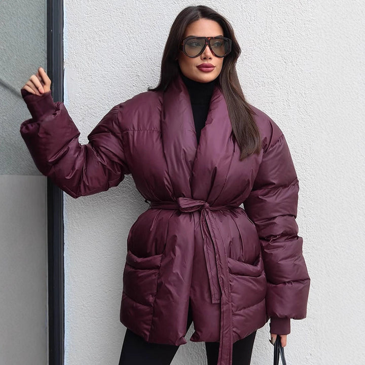 Damen Gesteppte Taillierte Steppjacke mit Schalkragen und Bindegürtel Echoarchiv