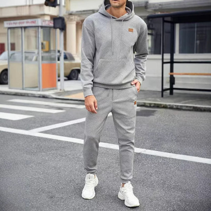 Herren Freizeit-Jogginganzug mit strukturiertem Design und praktischen Taschen Echoarchiv