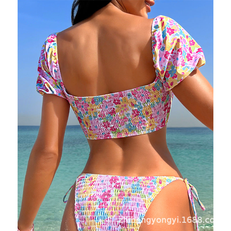 Damen Bikinikostüm mit Rüschenärmeln und modischem Cut-Out Echo Archiv