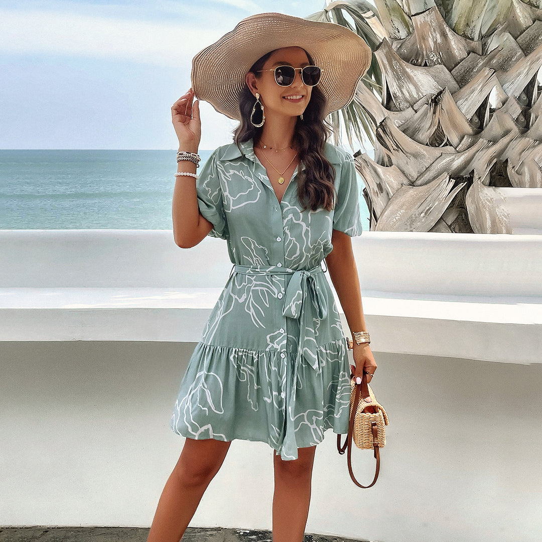Damen Sommerliches Kleid mit Wellenmuster und Taillengürtel Echo Archiv
