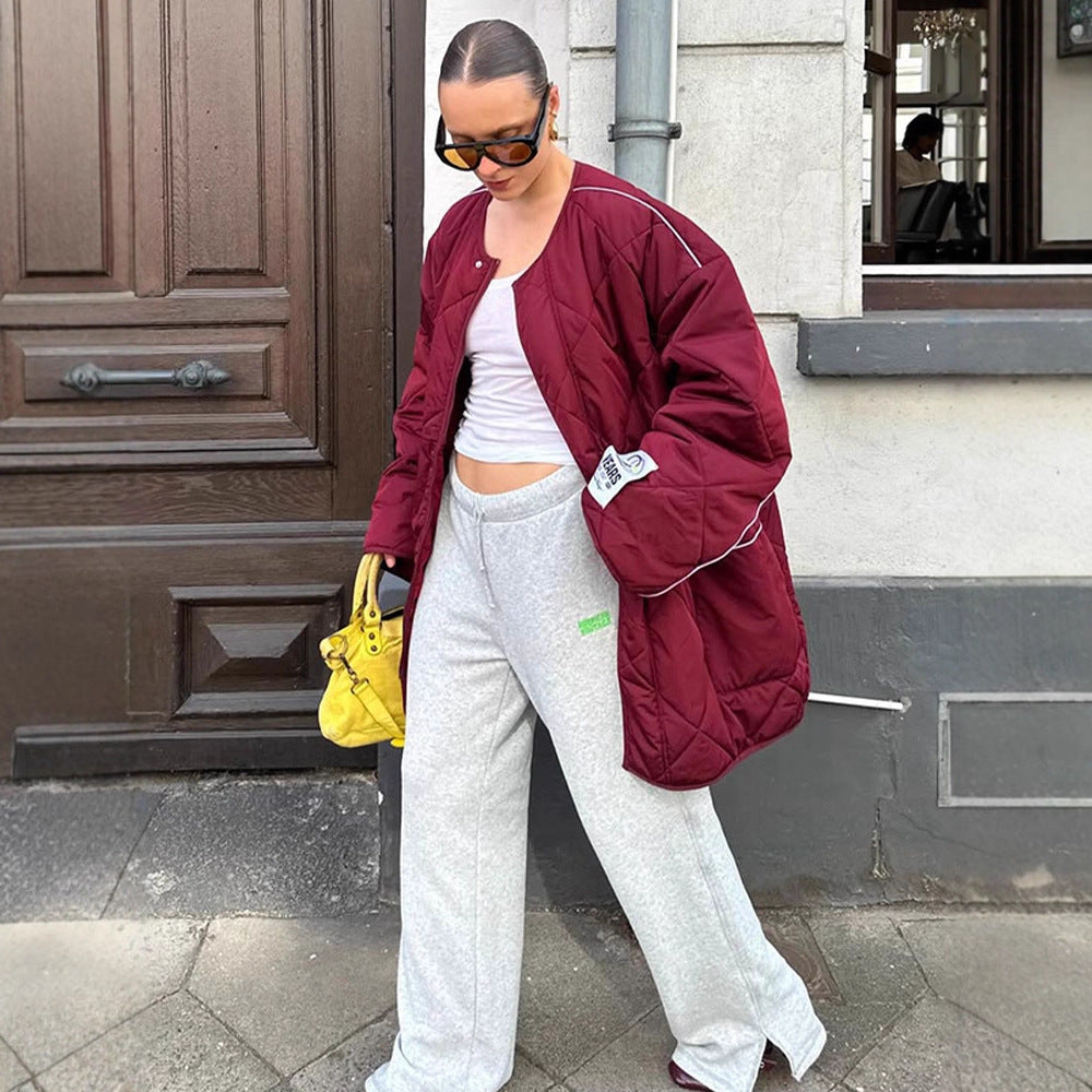 Damen Oversize-Steppjacke mit Diamantstepp, kontrastierender Paspel und Druckknopfverschluss Echoarchiv