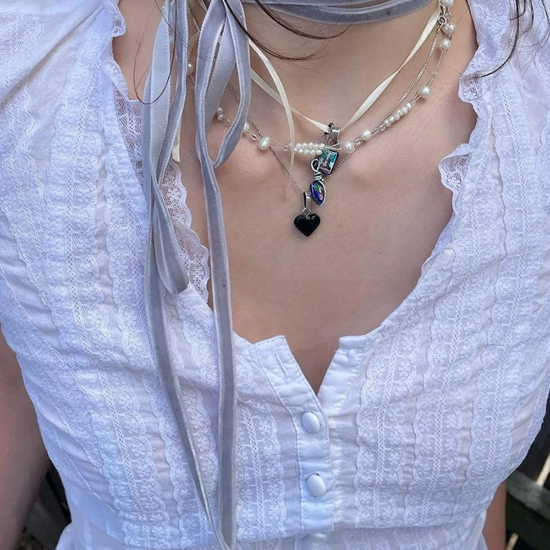 Damen Elegantes Blusenoberteil mit Rüschendetails und Knopfleiste Echo Archiv