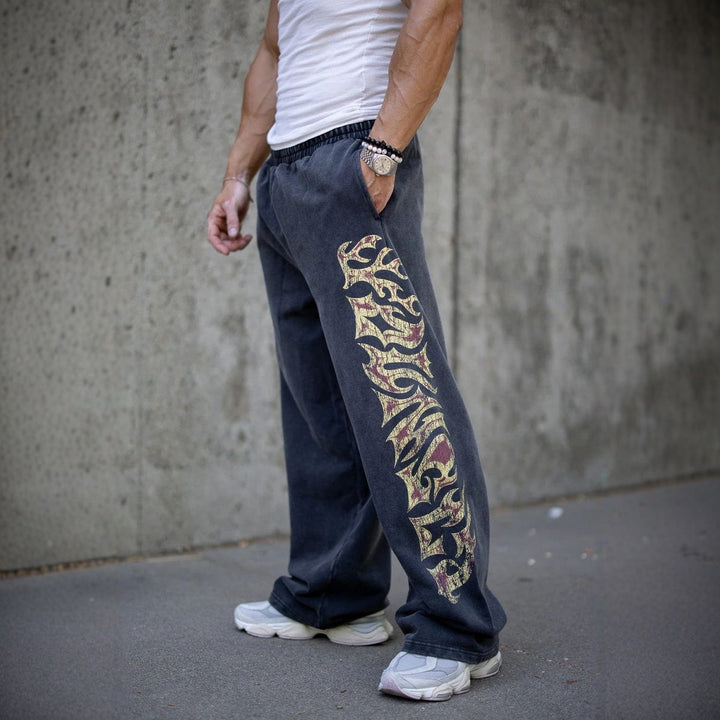 Herren nan weite Jogginghose mit elastischem Bund, Seitentaschen und detailreichem Schädel- und Rosenmotiv Echo Archiv