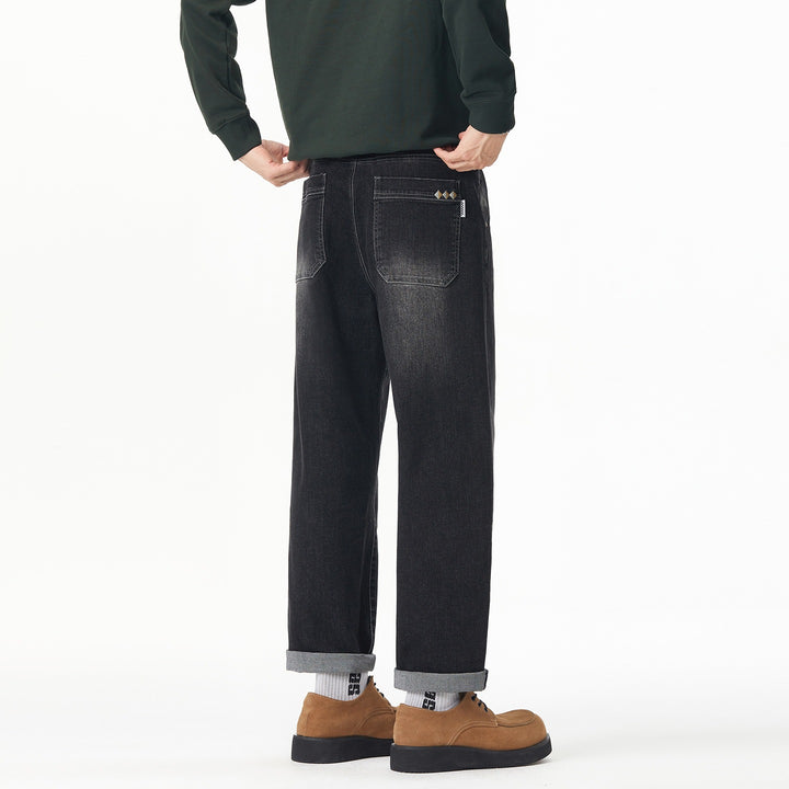 Herren Weite gerade geschnittene Denim-Jeans mit Used‑Wash und Umschlagbund Echoarchiv