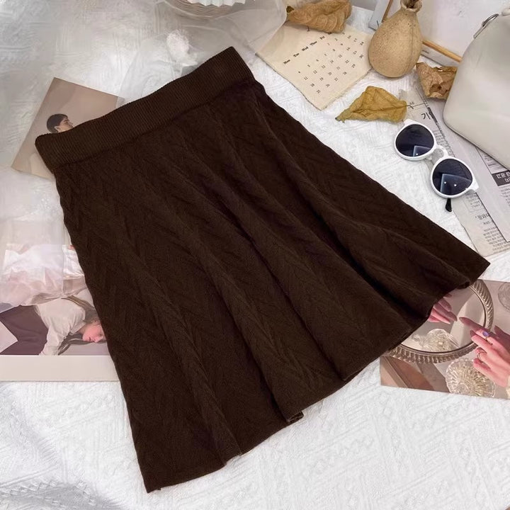 Damen Plissierter Strickrock mit Zopfmuster Echo Archiv
