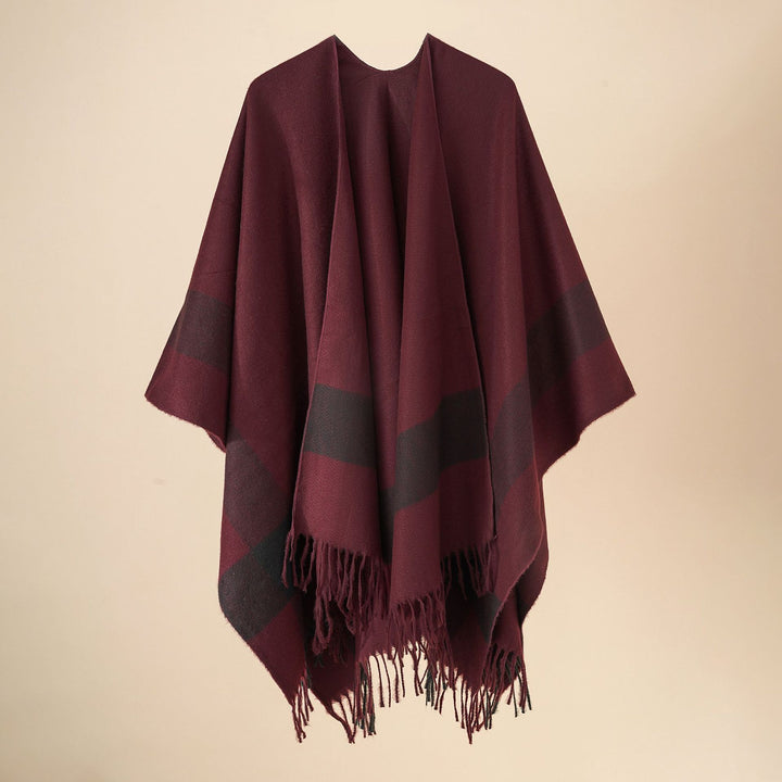 Damen Kuscheliger Oversize Poncho mit Fransen und Blockstreifen – Avérine