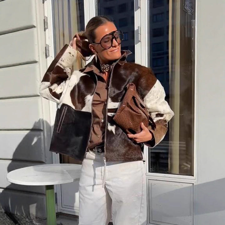 Damen Kurzjacke aus Haarigem Kunstfell mit Patchwork‑Optik und hohem Stehkragen Echoarchiv