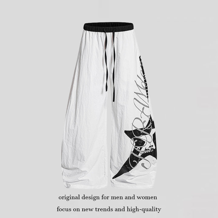 Damen Weite Palazzo-Hose mit Tunnelzugbund und großflächigem Statement-Print Echoarchiv