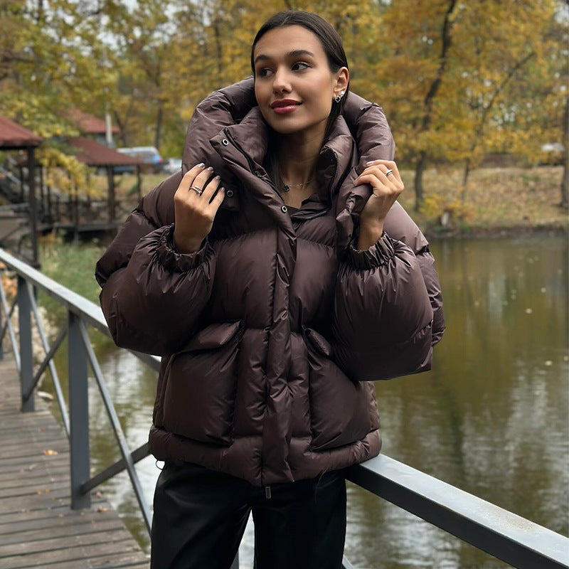 Echoarchiv | Damen Gesteppte Winterjacke mit Oversized Kapuze – Warm, Wasserabweisend & Modern
