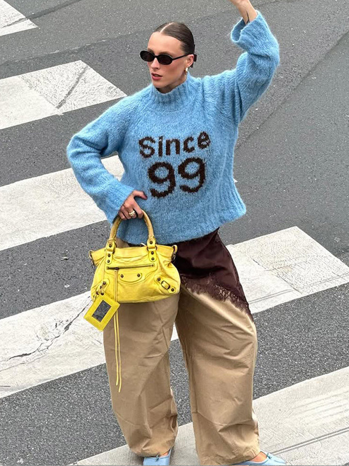 Damen kuscheliger Oversize-Mohairpullover mit hohem Rollkragen und Statement-Logo Echoarchiv