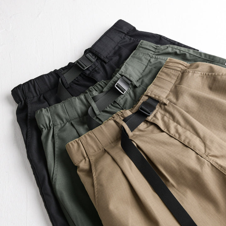 Herren Relaxte Baumwollhose mit elastischem Bund, integrierter Webbing-Gürtel und konischem Bein Echoarchiv
