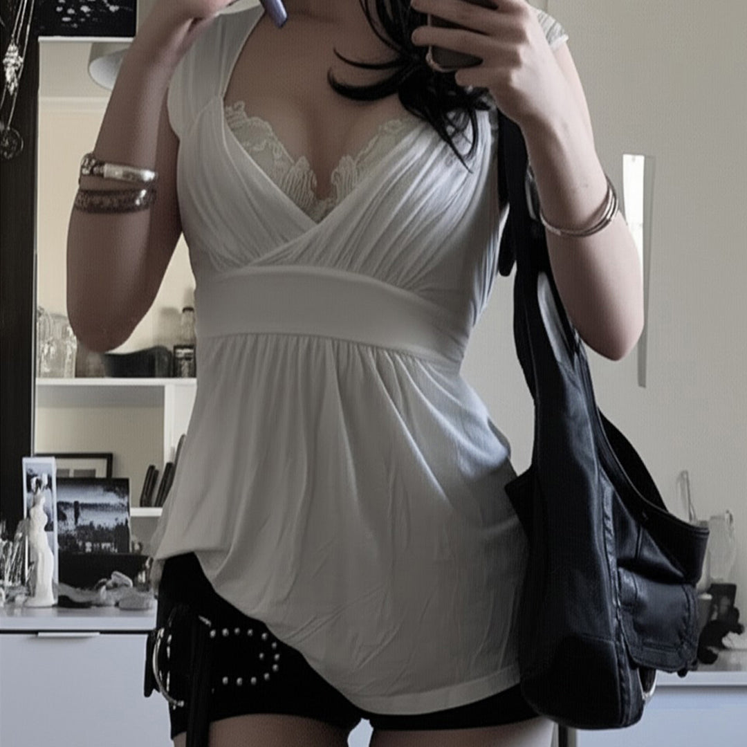Damenkleid mit raffinierter Spitzenapplikation und weich fließendem Stoff Echo Archiv