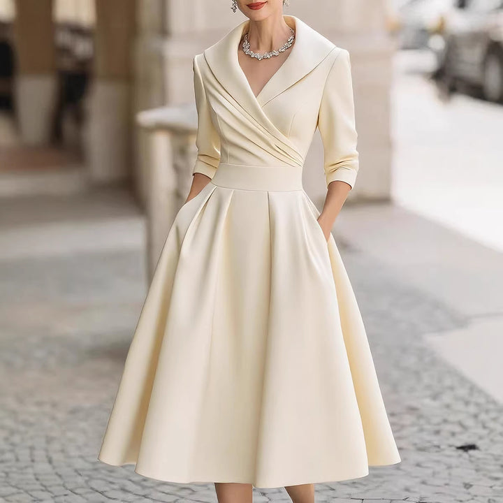 Damen nan elegantes Midikleid mit Wickeloberteil, Dreiviertelärmeln und Eingrifftaschen Echo Archiv