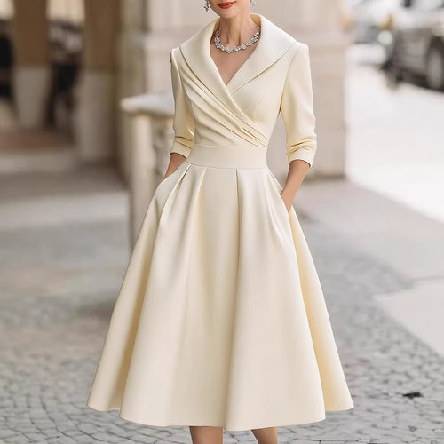 Damen nan elegantes Midikleid mit Wickeloberteil, Dreiviertelärmeln und Eingrifftaschen Echo Archiv