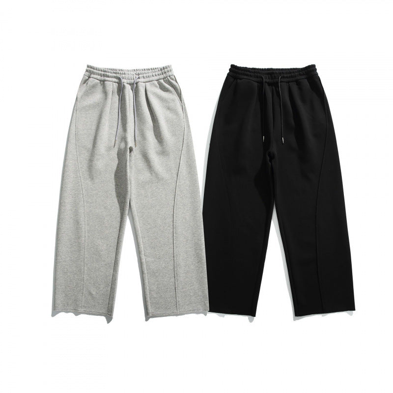 Unisex Weite Baumwoll-Fleece-Jogginghose mit Tunnelzug, Dekorativen Vordernähten und Raw-Saum Echo Archiv