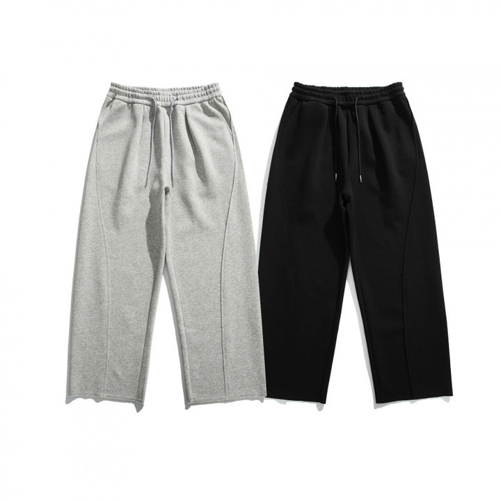 Unisex Weite Baumwoll-Fleece-Jogginghose mit Tunnelzug, Dekorativen Vordernähten und Raw-Saum Echo Archiv