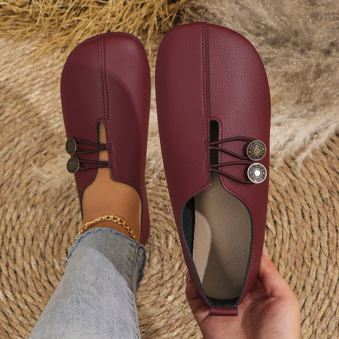 Damen  flache Slipper-Pantoletten aus Wildlederoptik mit elastischer Schnürung und dekorativem Zierknopf Echo Archiv