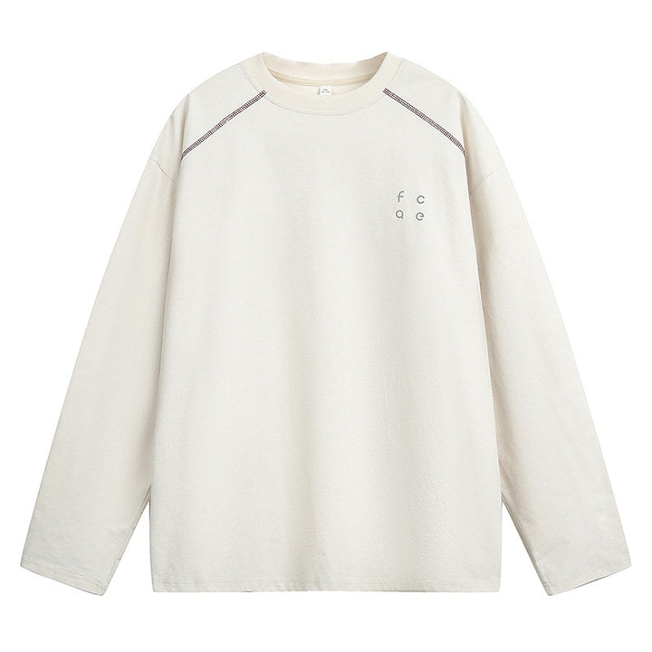 Unisex Oversize Langarmshirt aus Baumwollmix mit Raglannähten und minimalistischer Bruststickerei Echo Archiv