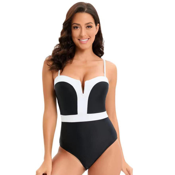 Damen Eleganter Einteiler Badeanzug mit tiefem V-Ausschnitt und kontrastierenden Details Echo Archiv