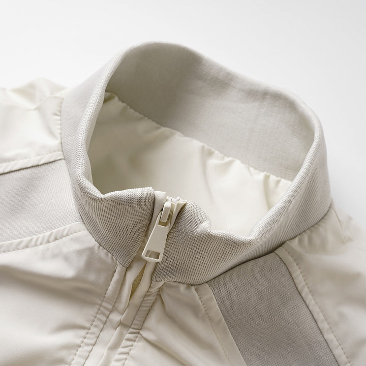 Damen Minimalistische leichte Nylon-Bomberjacke mit Rippkragen, Raglanärmeln & elastischem Saum Echoarchiv