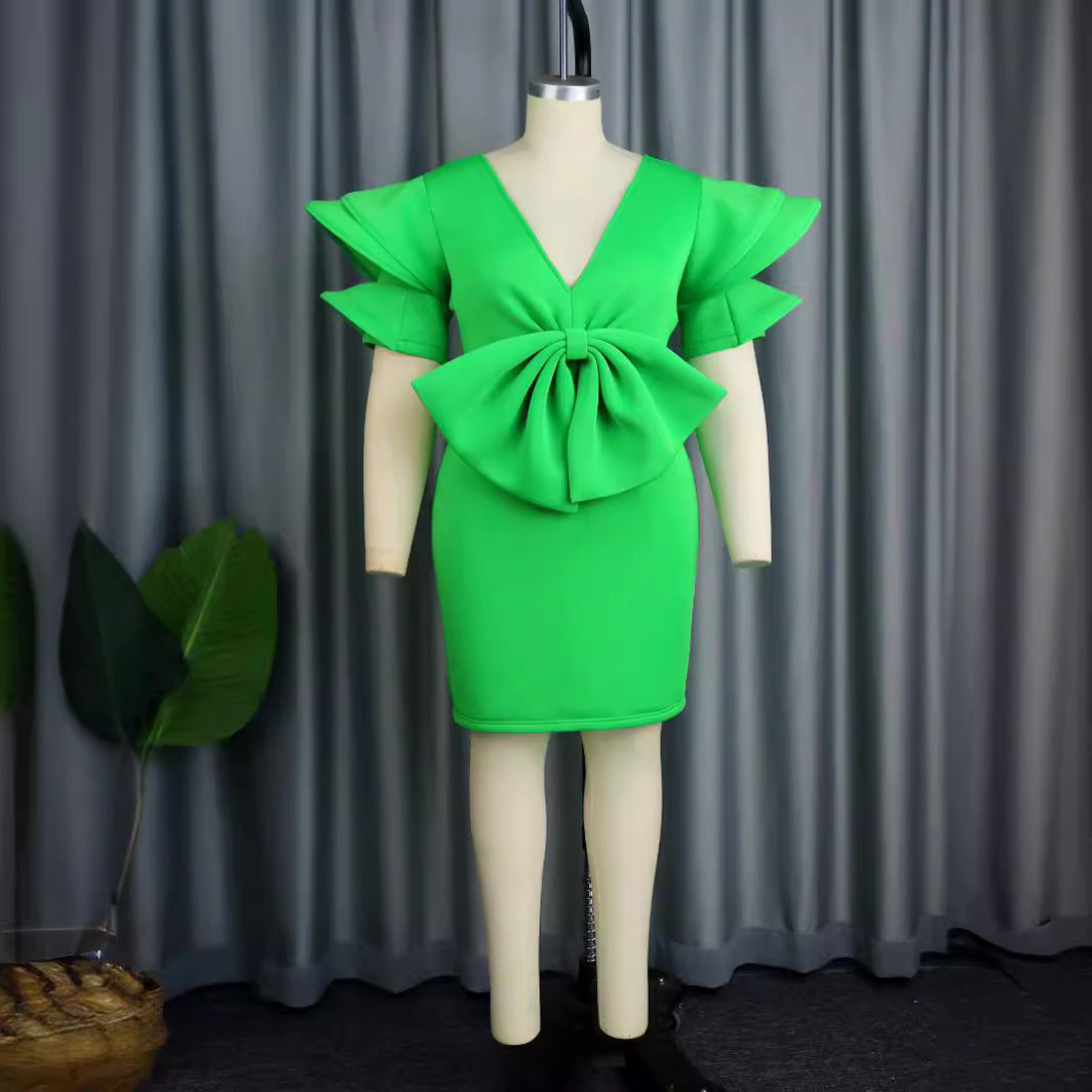 Damen Kleid mit voluminösen Rüschensäumen und dekorativem Schleifenakzent Echo Archiv
