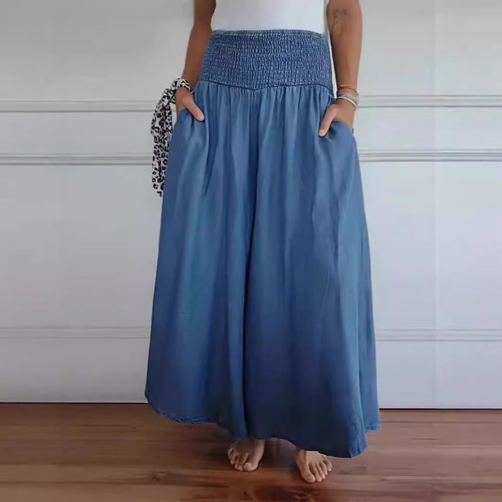 Damen-Maxi-Rock mit hohem Smockbund, weitem Fall und seitlichen Taschen – Valéora
