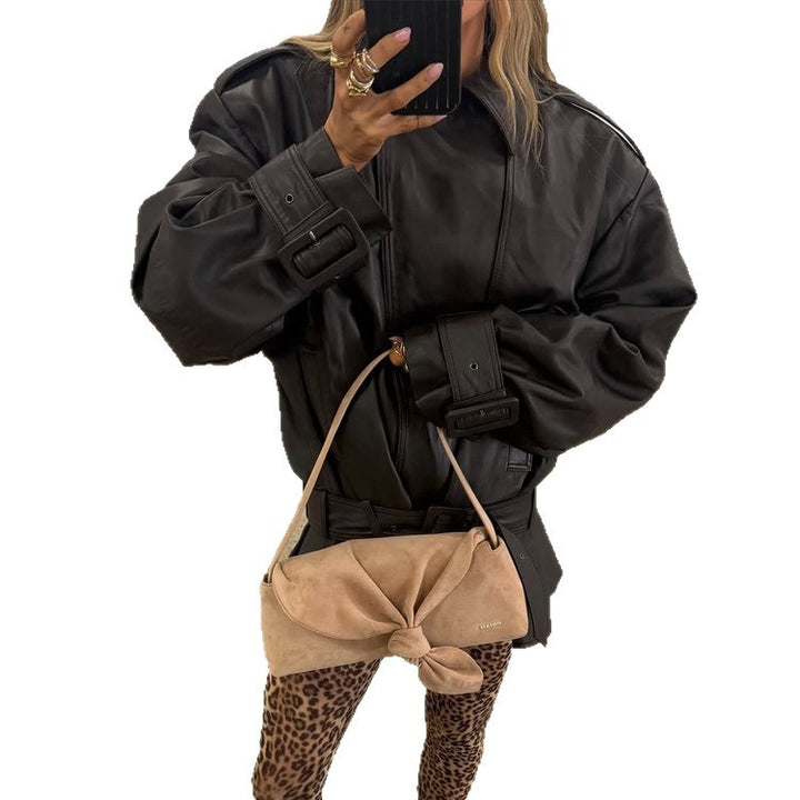 Damen Oversize-Lederjacke mit taillierendem Bindegürtel und Volant-Saum Echoarchiv