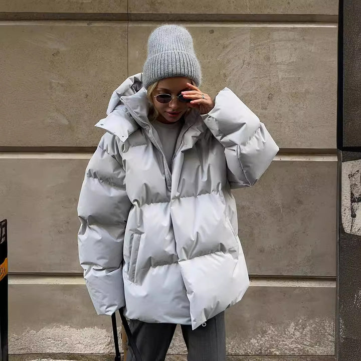 Damen Oversize Steppjacke mit Kapuze und wattierter Thermofüllung Echoarchiv