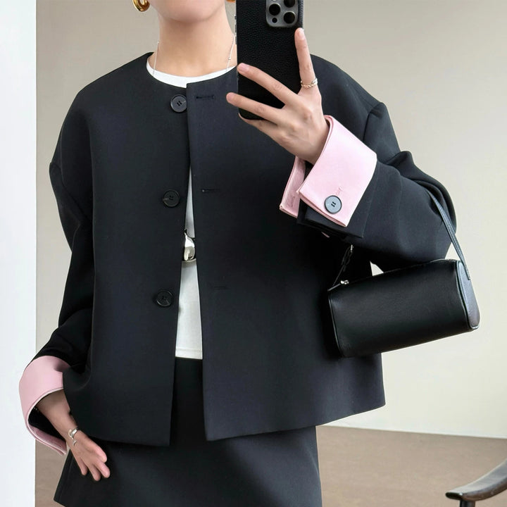 Damen Modische und elegante Jacke mit kontrastierenden Ärmeln Echoarchiv