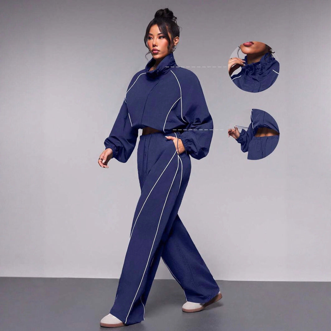Damen sportives Cropped Windbreaker-Set mit Stehkragen Tunnelzug und reflektierenden Paspeln – Avérine