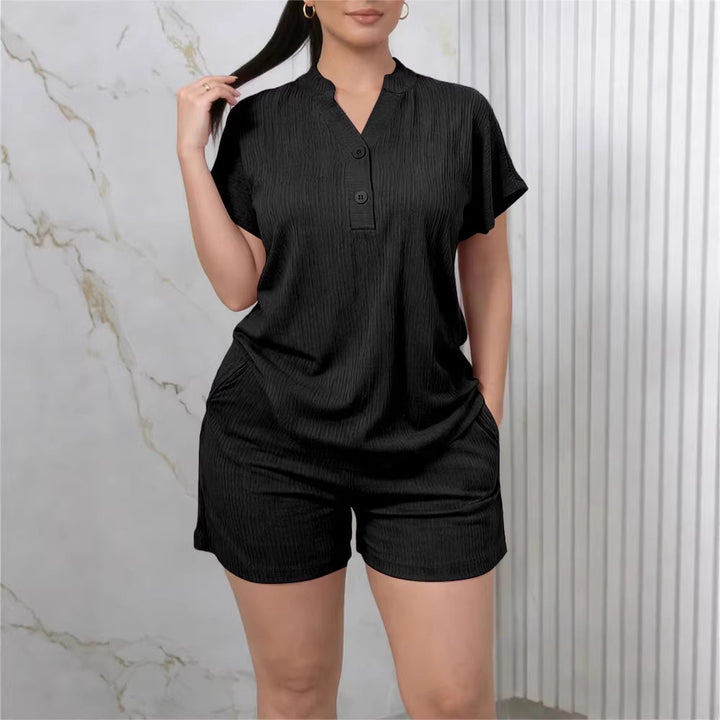 Damen Freizeit-Jumpsuit mit Knopfleiste und seitlichen Taschen Echo Archiv