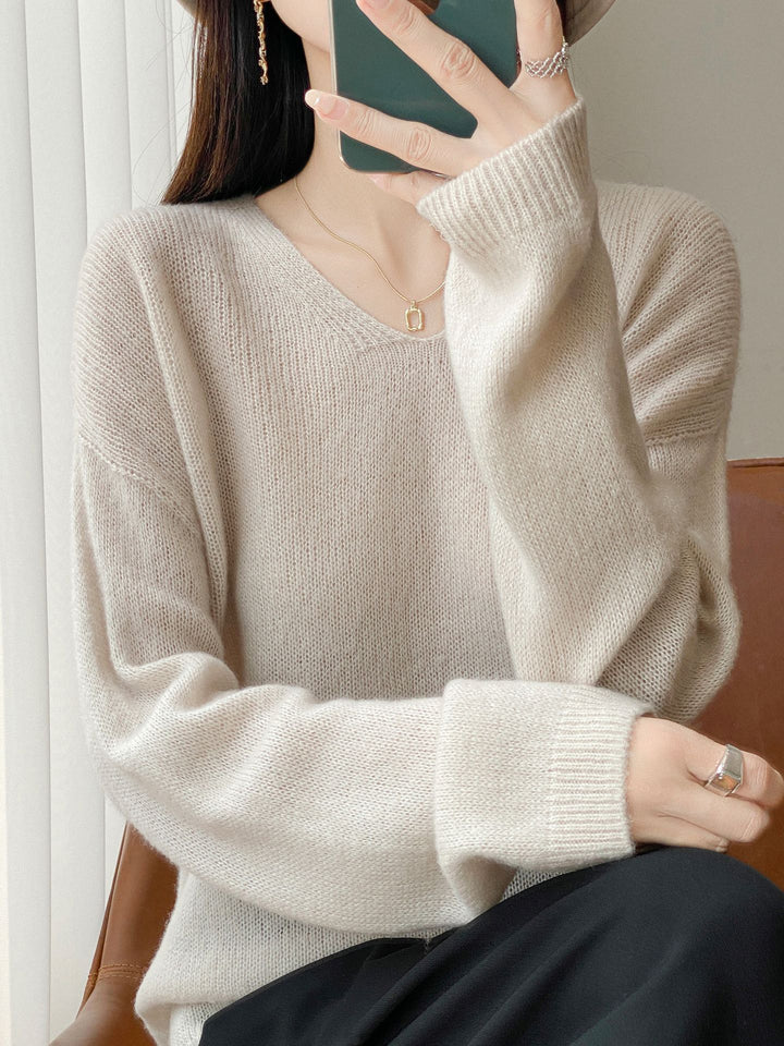 Damen Oversize-Feinstrickpullover mit feinem V-Ausschnitt und verlängertem Ärmelabschlusst Echoarchiv