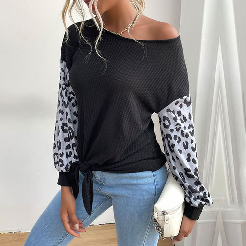 Damen Lässiges Shirt mit Waffelstruktur, Leoparden-Ärmeln und Knotenfront Echoarchiv
