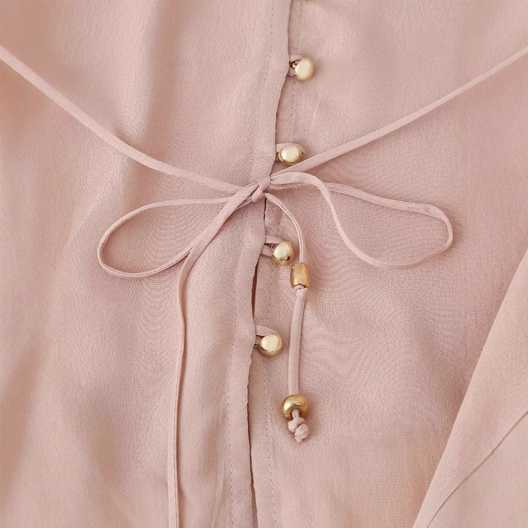 Damen nan elegante Bluse mit Perlenknopfleiste, Taillenzug und leichtem Schößchen Echo Archiv