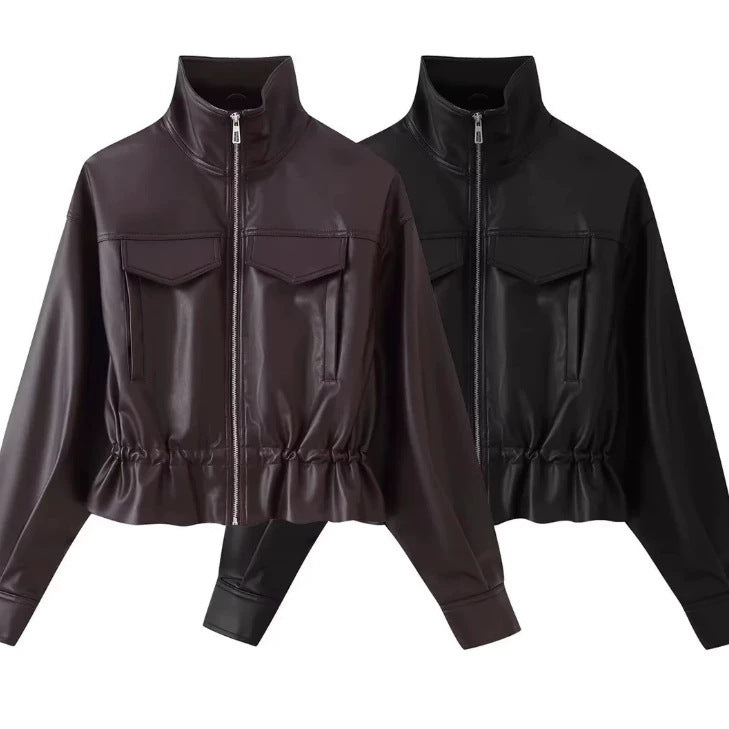 Damen gekürzte Kunstlederjacke mit Stehkragen, Reißverschluss und taillierendem Smok Echo Archiv