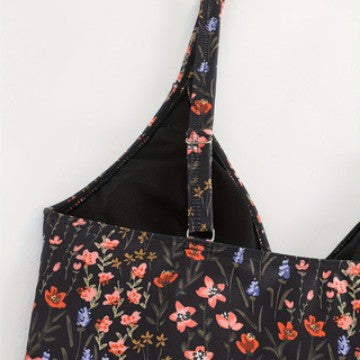 Damen eleganter und figurbetonter Badeanzug mit floralem Design Echo Archiv