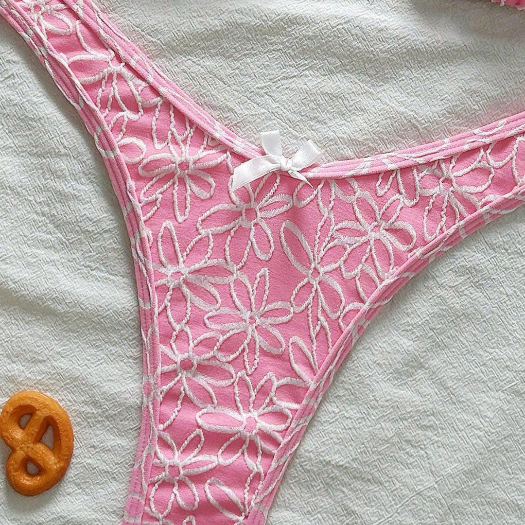 Damen Verspielter Triangel-Bikini mit floralen Applikationen Echo Archiv