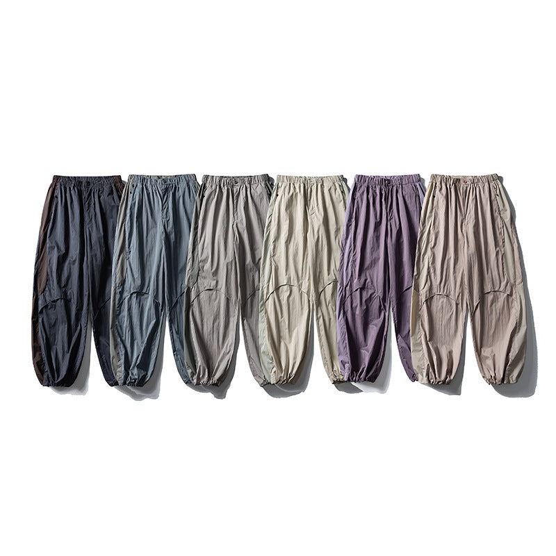 Herren Weite technische Nylon-Cargohose mit elastischem Bund und Paneel-Details Echoarchiv